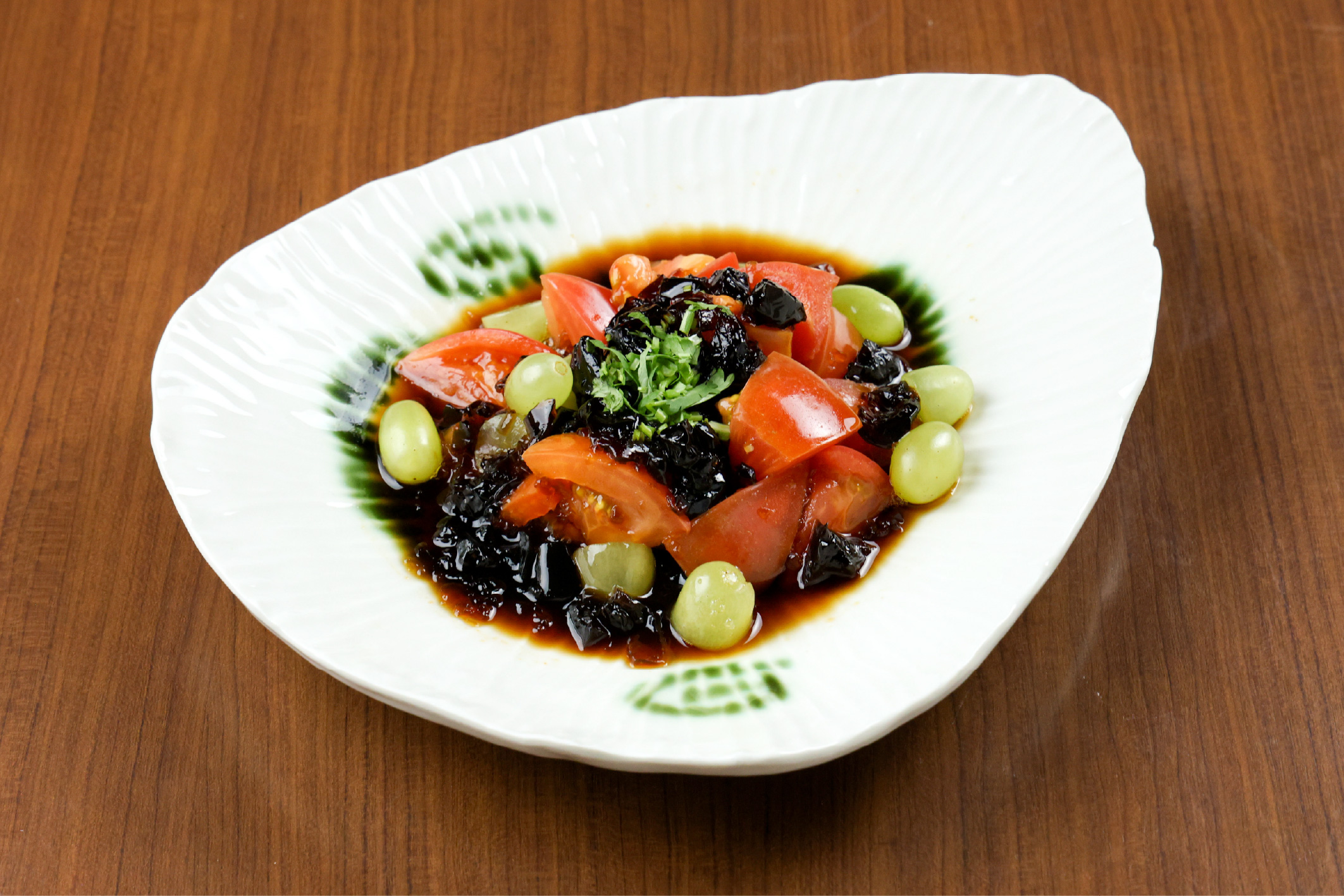 <p>浜松産トマトの黒酢ソース和え</p>